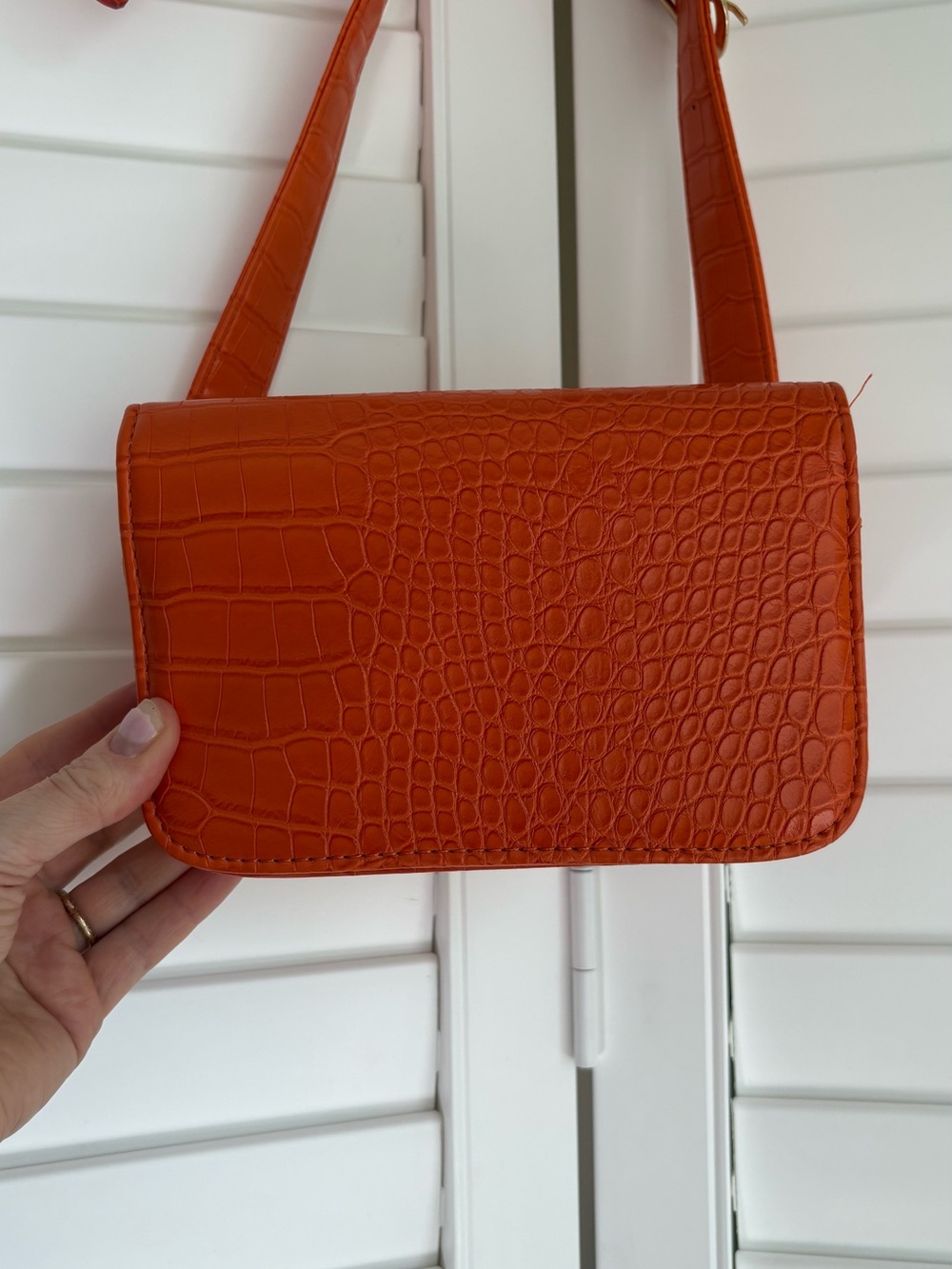 Orange faux croc belt bag